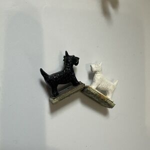 Vintage 1946 novelty toy "Tricky Dogs" likely reproduction Scottish Terrier